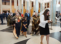 Thumbnail image: Welcome to Country ceremony performers leave the Great Hall